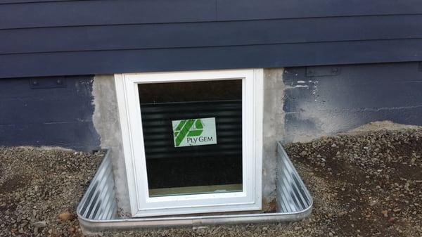 We just installed the Egress window and you can see they also got the retrofit done along the outside, and painted it!