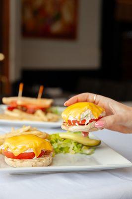 Tuna Melt 
tuna salad with sliced tomato on an English Muffin topped with melted American cheese