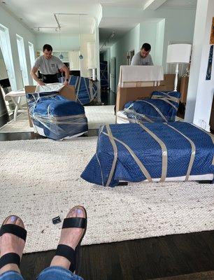 My friend in Chicago, with the nice pedicure (!) took this picture as she was watching the speed and careful packing of the movers.