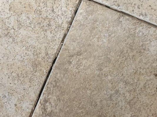 Crumbling grout days after second time around.