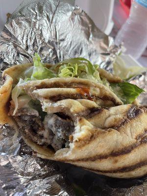 Delicious gyro on soft grilled pita