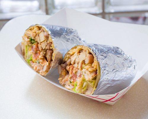 Burrito w/ a choice of Steak, Chicken, Beef, or Veggie. Comes with rice, beans, lettuce, cheese, sour cream, and Pico de gallo.