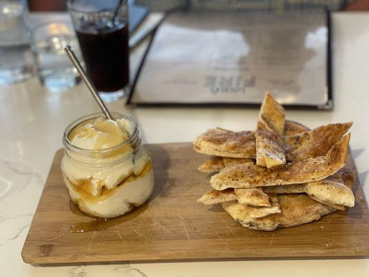 Housemaid ricotta cheese with honey and freshly made pizza crust