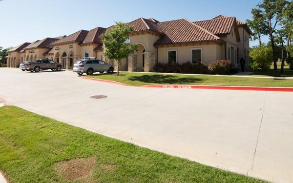 Office building appearance on entering parking lot.