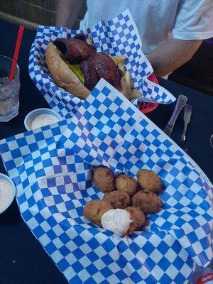 Sausage Poboy and hushpuppies