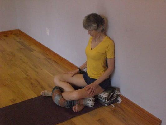 Pranayama practice with wall support