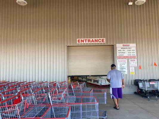 Don't try to get in before the doors are secure.  It is the fastest way to see it harsh look from the Costco employee