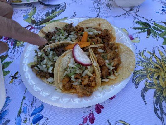 Steak, pork and chicken tacos. One dollar each.