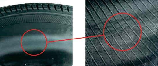 This is what wall stress from an under inflated tire actually looks like.  There are stress/fold lines in the rubber.