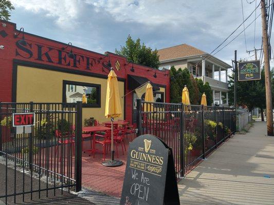 Awesome patio with nice chairs and tables! Umbrellas at the ready to be deployed!