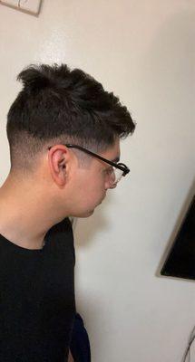 Uneven fade. Go to a barbershop instead.