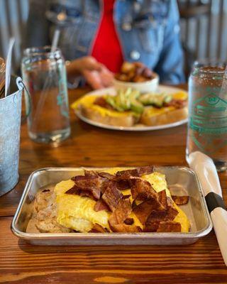 Biscuit and gravy  with eggs and Bacon .. delicious