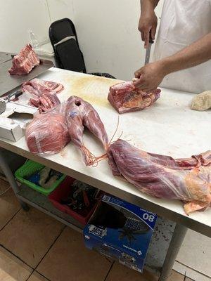 My own order getting prepared. Abu-Bakaar trimming my meats