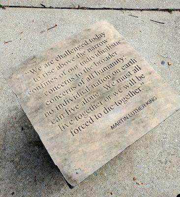 March 2021: One of two individual concrete benches in front of the shoppe