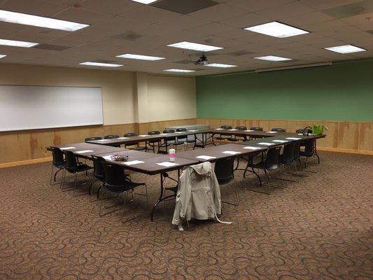 Large meeting room set up to accommodate about 25 people, but can be configured in lots of different ways for more attendees.