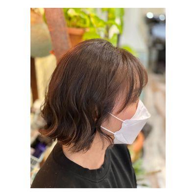 Wavy bob style haircut with nice bangs