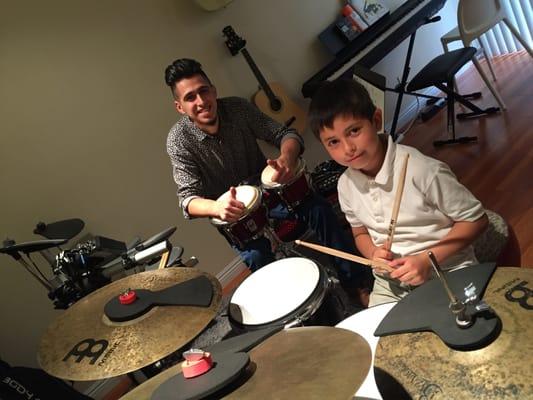 Ricardo teaching Matin drums and working on our rock groove and timing. Martin is 7 years old.