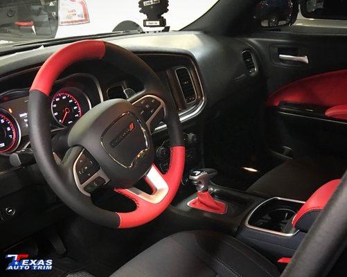 Dodge Charger's interior redone with a hint of red on the steering wheel, shifter, center console, and door panels.