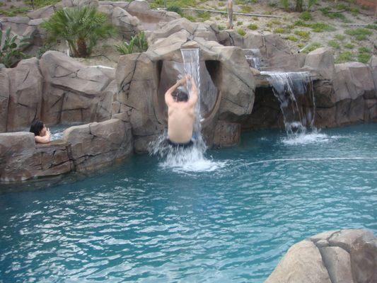 Daredevil going down the slide backwards