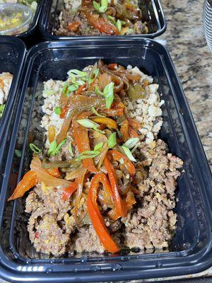 Mongolian beef, sauteed onions and peppers, and brown rice