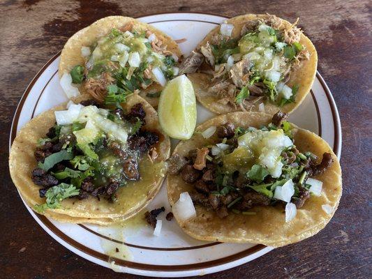 Tacos made with corn tortillas 2 chicken Pastor Carnitas