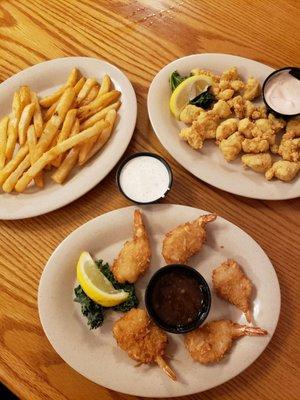 Gator tail, fries and coconut shrimp.  Asked 2 times for more fries.  Denied.  Food was still good.