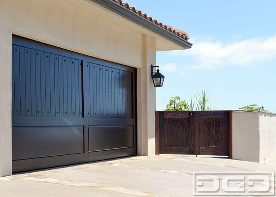 Complementing designed garage doors and garden gates for an RPV residence. Custom handcrafted by Dynamic Garage Door!