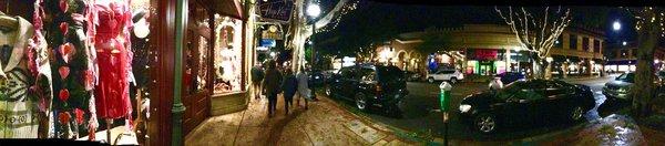 A panorama picture of Hepkat and other shops on Higuera Street after dark, around 10pm"ish, Valentines week, 2017.