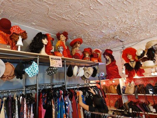 Wigs, hats, clothing, and purses