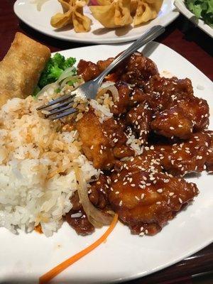 Chinese steamed rice and sesame chicken