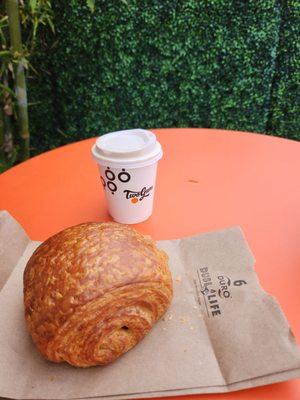 Pain au chocolat ($5.50) and cappuccino ($4.45)