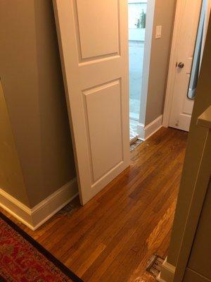 The bathroom barn door isn't hung and the floor needs to be patched. I was told he would provide the door hardware, but he hasn't.