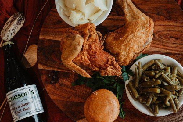 Half fried Chicken with Cabbage, String Beans and Corn bread.