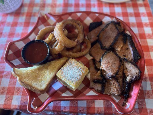 Beef brisket and two sides (onion rings and corn bread)