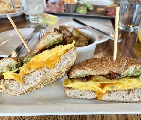 Bacon egg and cheddar bagel, added avocado. So good!