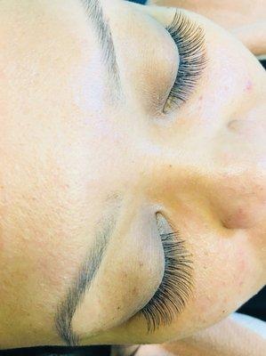 Eye lash extension- medium length set- very natural looking and has a light feeling.