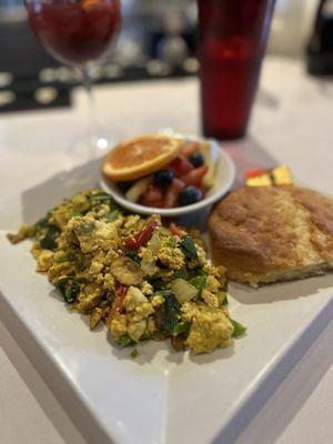 Tofu scramble with fruit and biscuit (not vegan)