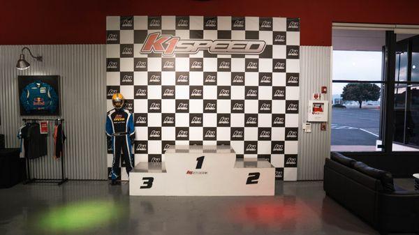 Don't leave without getting your picture taken on our podium!