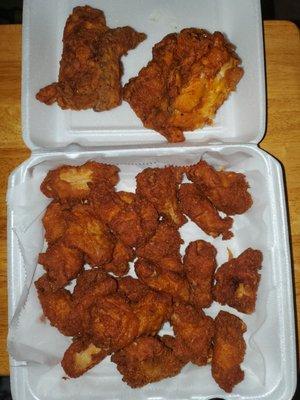 Fried chicken breasts and an order of wings.