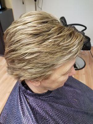 Short layered cut with blonde highlights