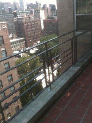 Custom fitted Lexan to provide safety for young children and pets at open balcony railing.