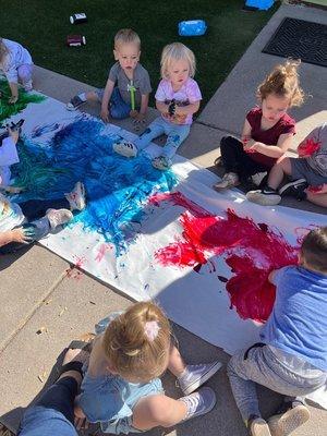 Whole body painting sensory experience. At preschool, it's play clothes only. Learning is messy!