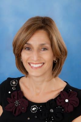 Dr. Gloria Boms, Audiologist/Owner