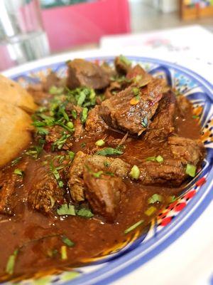 Lamb Kamounia Torta Ahogado ($16-) Braised in cumin, harissa, drowned in sauce, escabeche. Delicious mix of lamb/liver