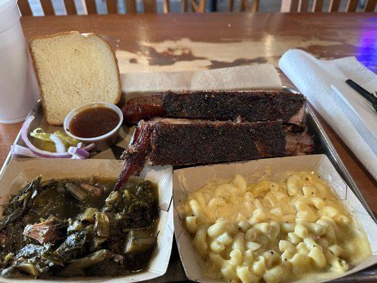 Collard greens, Mac and cheese, sausage, brisket, and ribs. 3 meat plate.