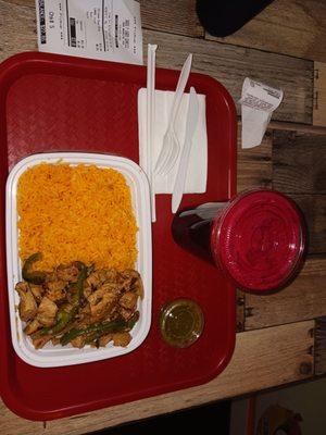 Chicken over yellow rice with apple and beet juice .