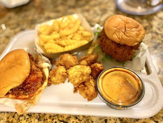 Korean style fried chicken sandwich ( Left ) Gochujang chicken bites ( center ), Crispy chicken sandwich (right )