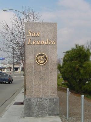 Aluminum letters & logo plaque mounted on custom marble monument