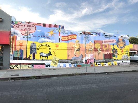 Paul McCartney album release mural. Hand-painted advertisement. 8201 Melrose Ave, Los Angeles, CA.