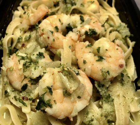 House made Shrimp Scampi on fettuccine Pasta